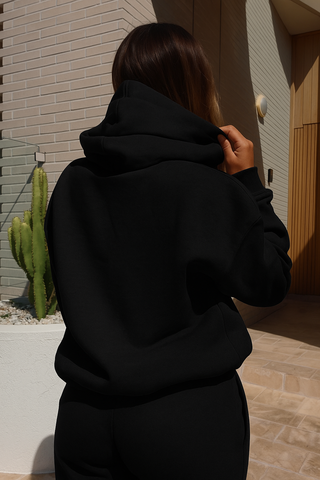 Oversized Black Signature Plush hoodie made from 100% cotton with 3D tonal INTIMISSY branding