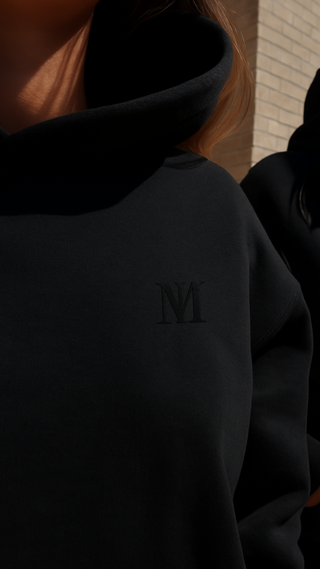 Oversized Black Signature Plush hoodie made from 100% cotton with 3D tonal INTIMISSY branding