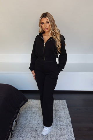 INTIMISSY Studio Plush Cargo pants in Caviar Black- front view showing premium plush fabric and relaxed fit