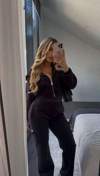 INTIMISSY Studio Plush Crop Jacket in Caviar – women’s black plush cropped jacket with gold zip, matching cargo pants streetwear set