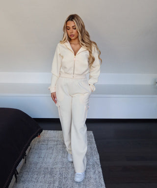 INTIMISSY Studio Plush Crop Jacket in Soufflé – women’s premium cropped zip jacket with gold hardware, soft plush streetwear set