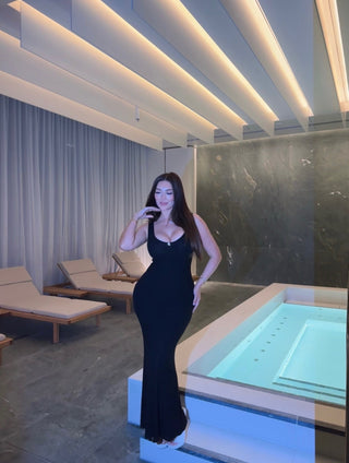 Dolce sculpted Maxi dress with scoop neckline and gold signature plaque showing contour silhouette 