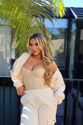 INTIMISSY Studio Plush Crop Jacket in Soufflé – women’s premium cropped zip jacket with gold hardware, soft plush streetwear set